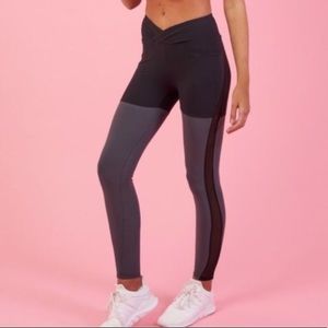 Nikki B Gymshark two-tone black and gray leggings.